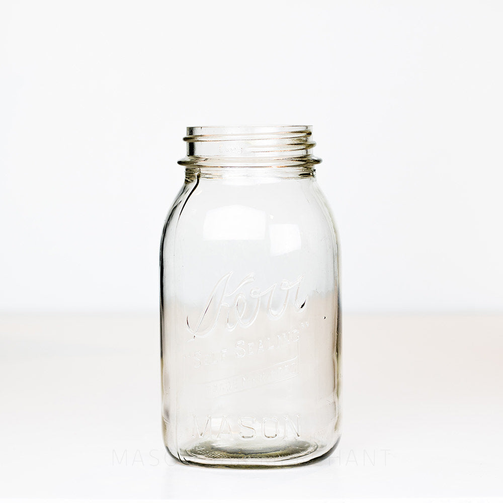 Vintage Kerr Regular Mouth Quart Jar on White Background. Reads Kerr &quot;Self Sealing&quot; [TRADE MARK REC].