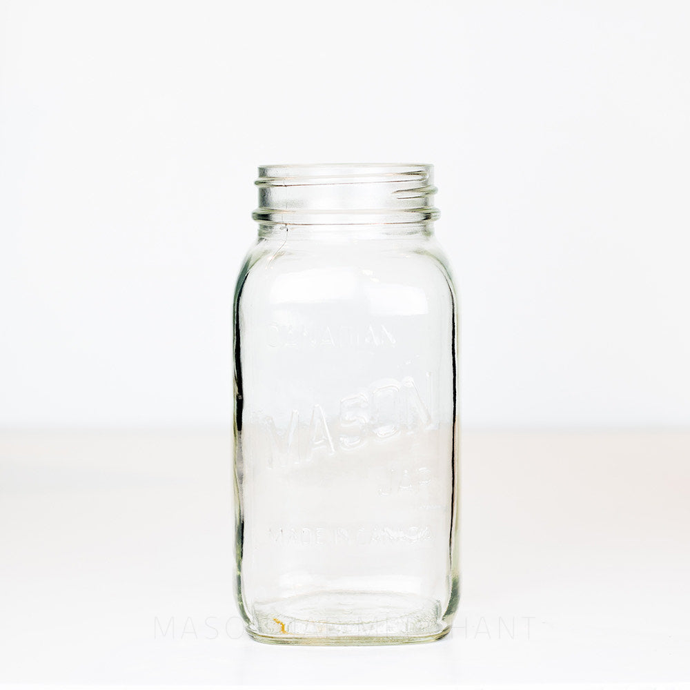 Regular mouth quart mason jar with &quot;Canadian Mason Jar - Made in Canada&quot; logo against a white background 