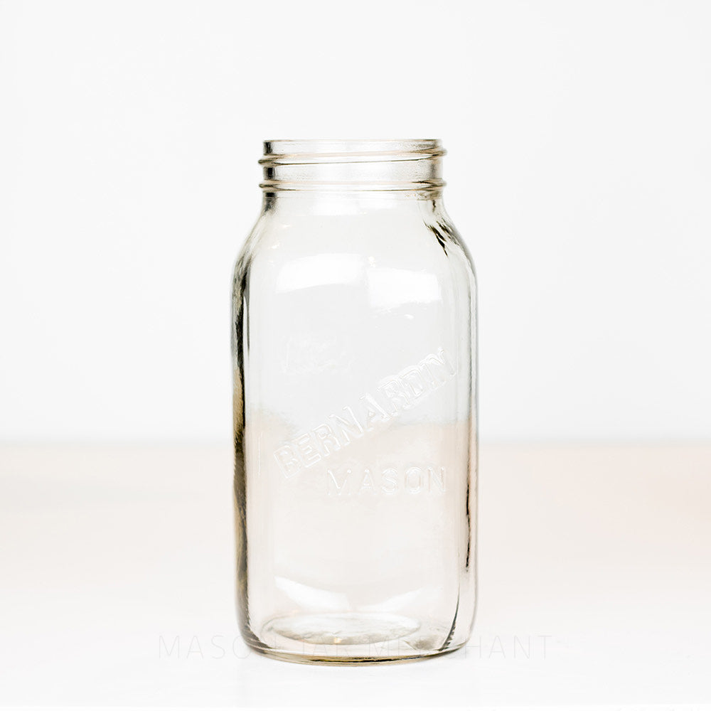 Regular mouth quart mason jar with Bernardin mason logo, on a white background 