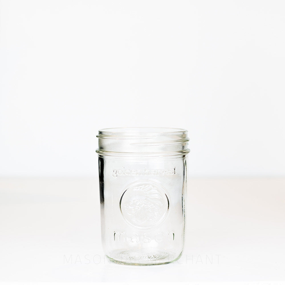 Golden Harvest wide mouth pint mason jar against a white background 