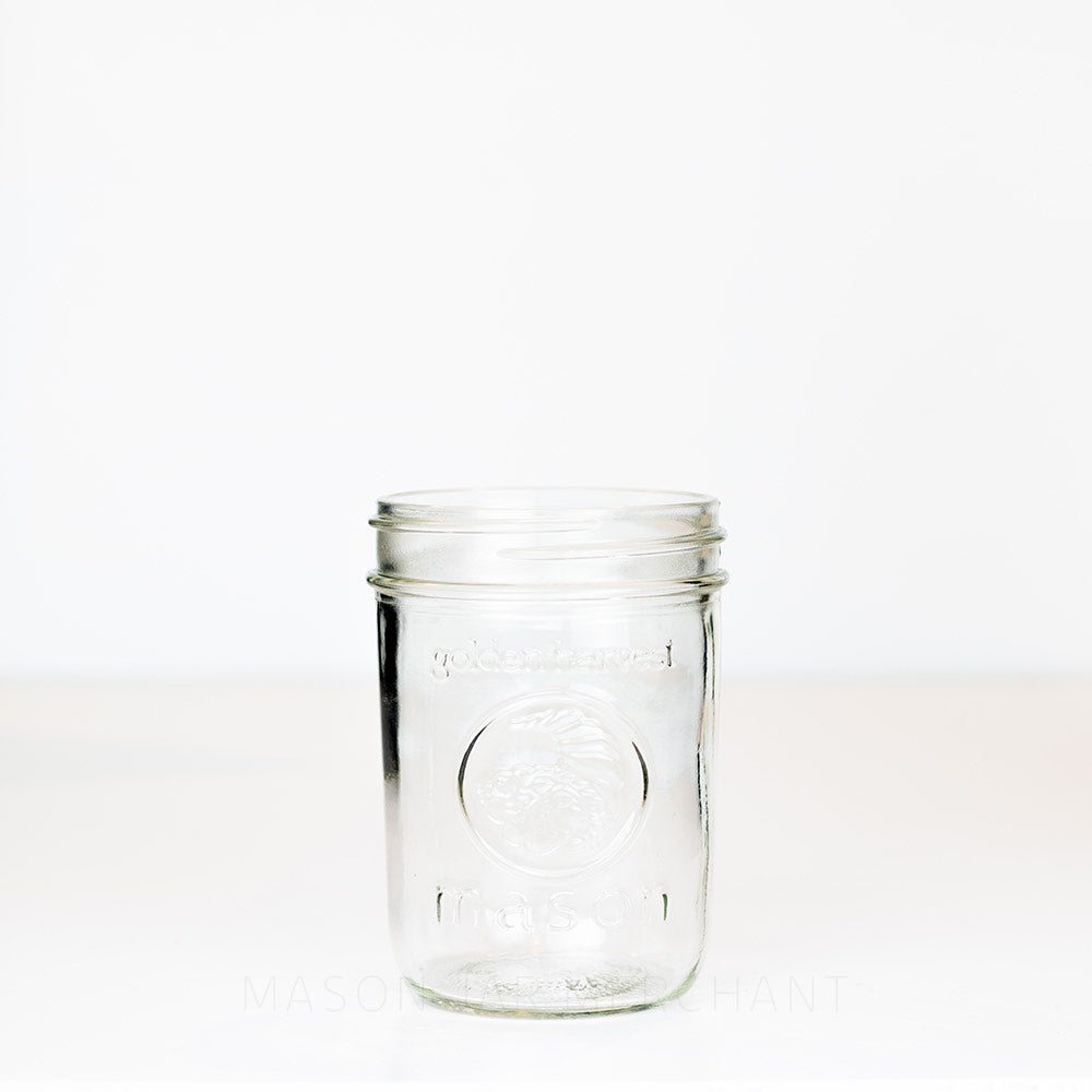 Golden Harvest wide mouth pint mason jar against a white background