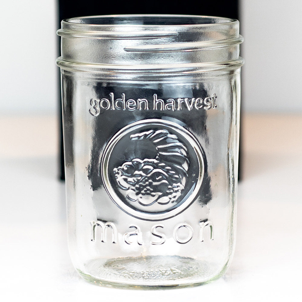 Golden Harvest wide mouth pint mason jar against a white background 