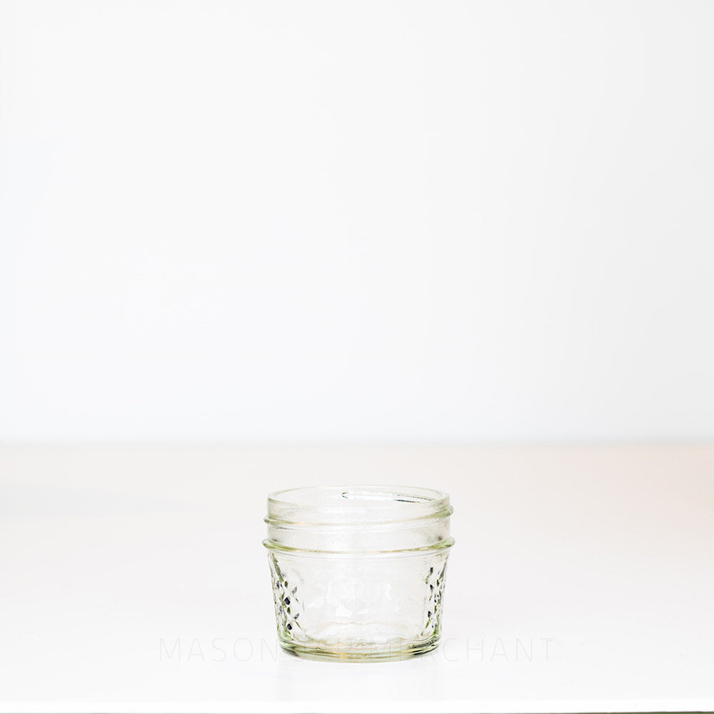 3 oz. regular mouth mason jar with a quilted pattern on a white background