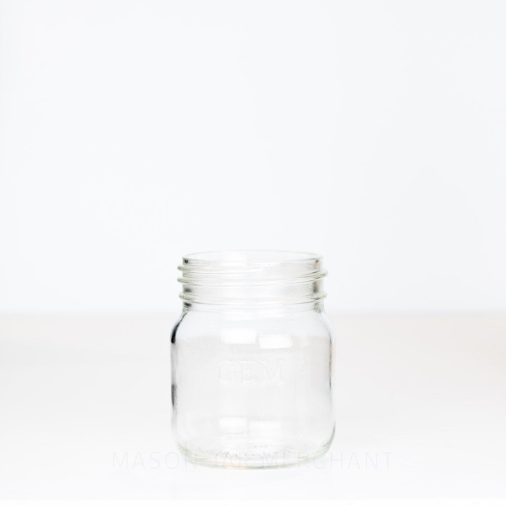 Adorable gem mouth 13 oz mason jar with GEM logo, on a white background