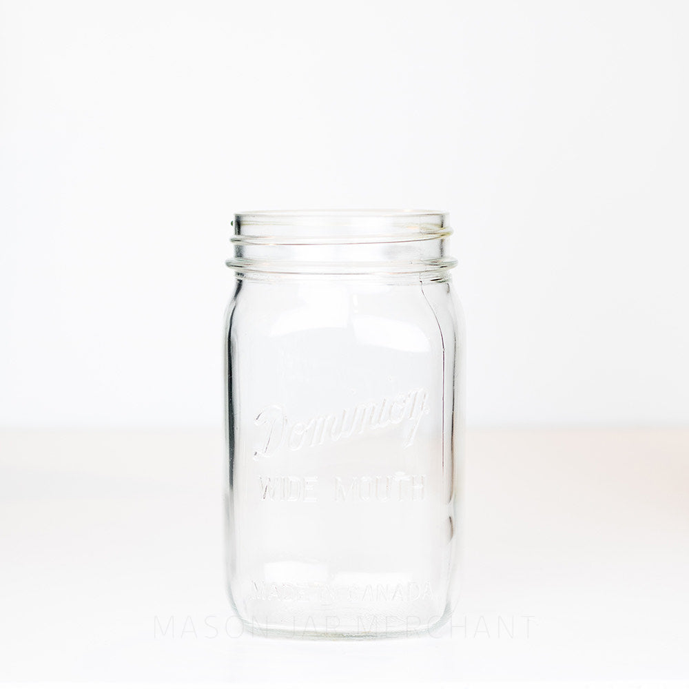 Wide mouth quart mason jar with Dominion Wide Mouth logo on a white background 