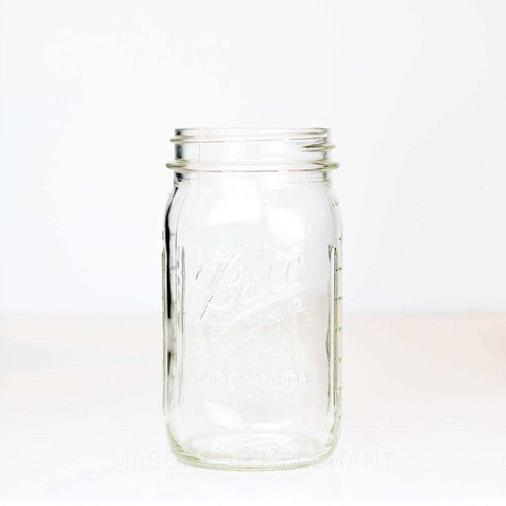 Wide mouth quart mason jar with Ball logo on a white background 