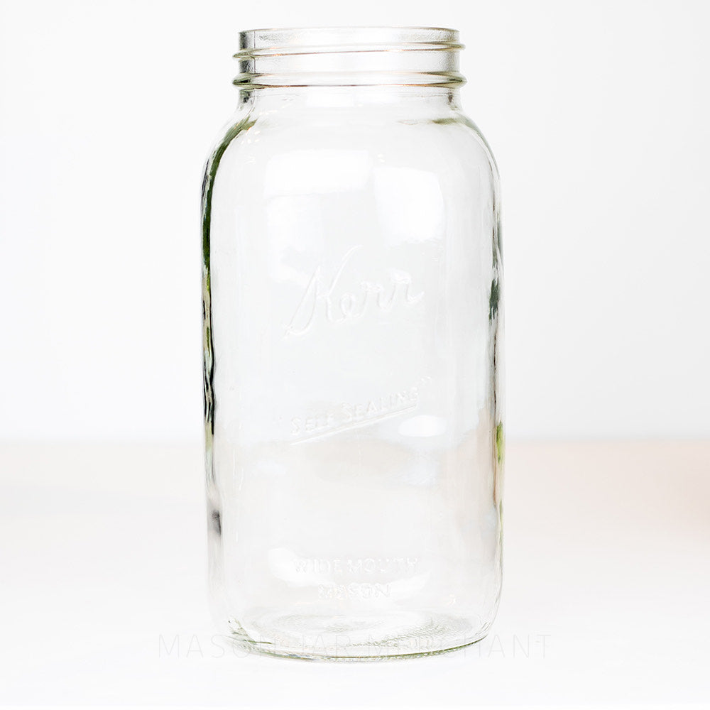 Wide mouth half gallon mason jar with Kerr logo on a white background 