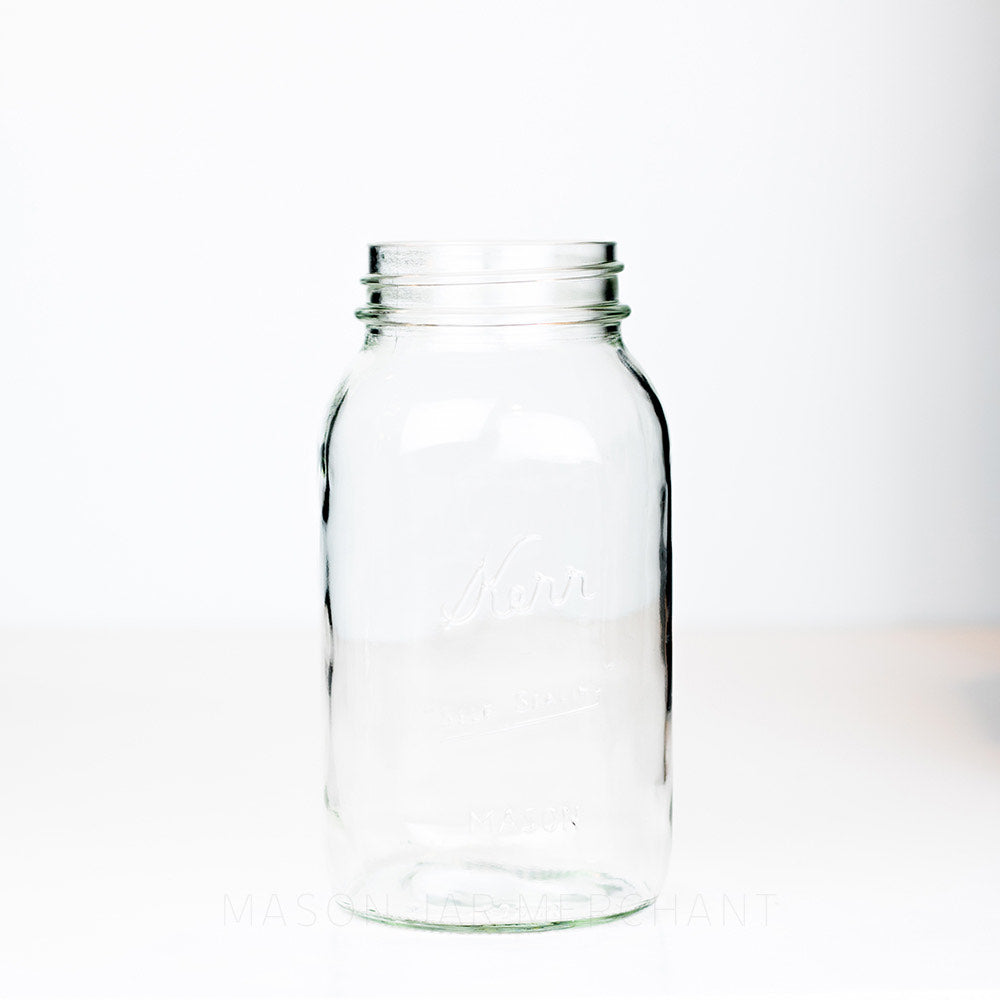 Regular mouth quart mason jar with Kerr self-sealing logo against a white background 