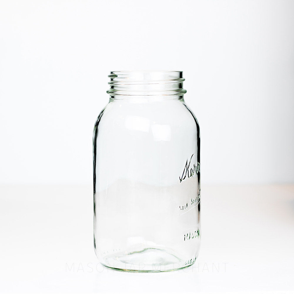 Side view of a Regular mouth quart mason jar with Kerr self-sealing logo against a white background