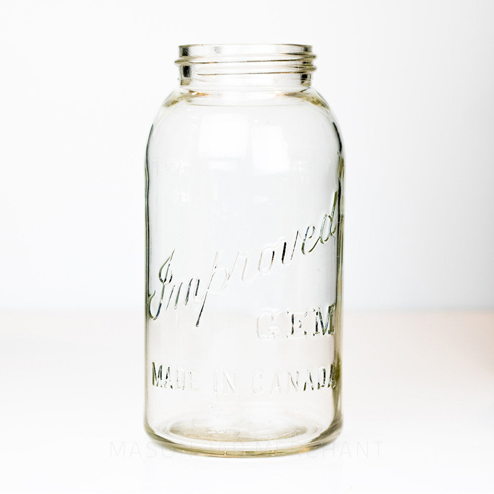 Gem mouth half gallon mason jar against a white background