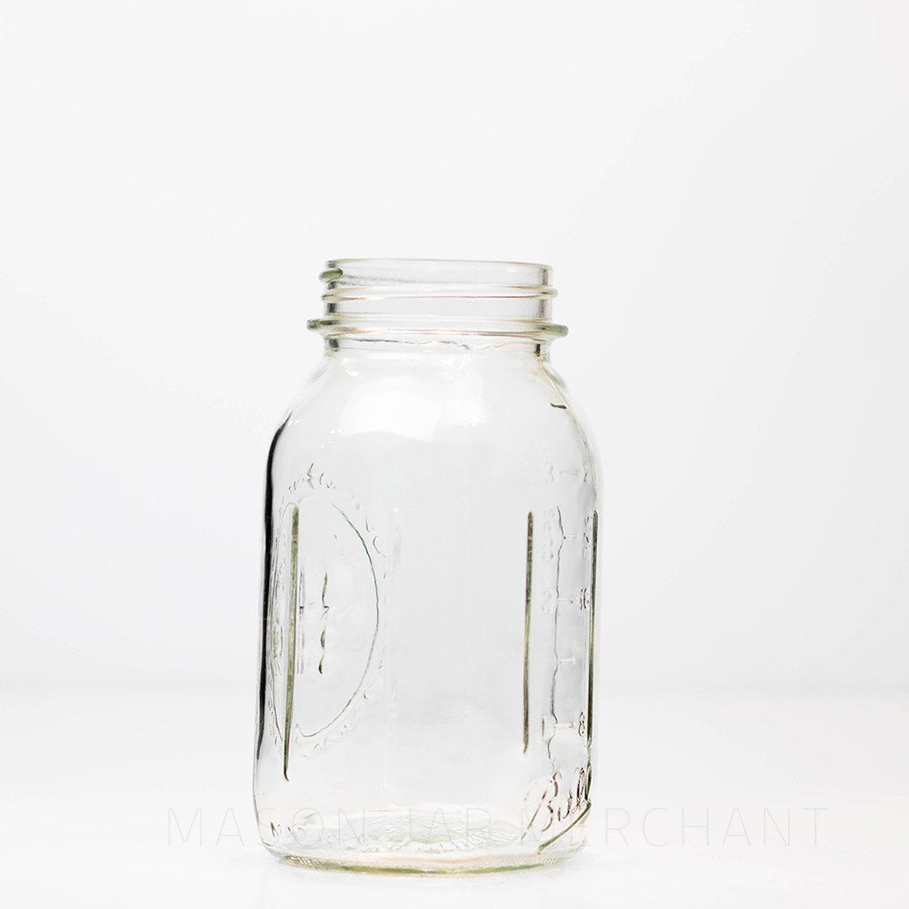 Ball regular mouth mason quart jar against a white background