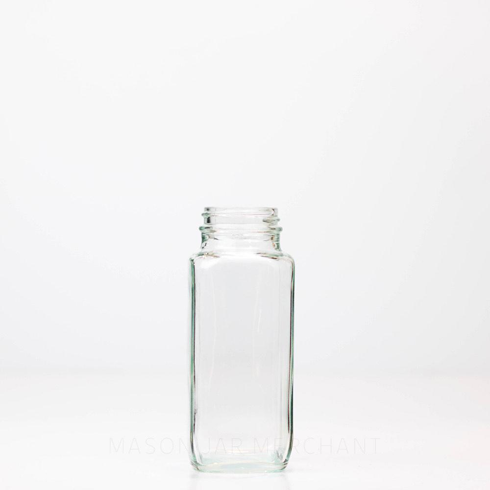 A 8 oz French Dairy Bottle against a white background