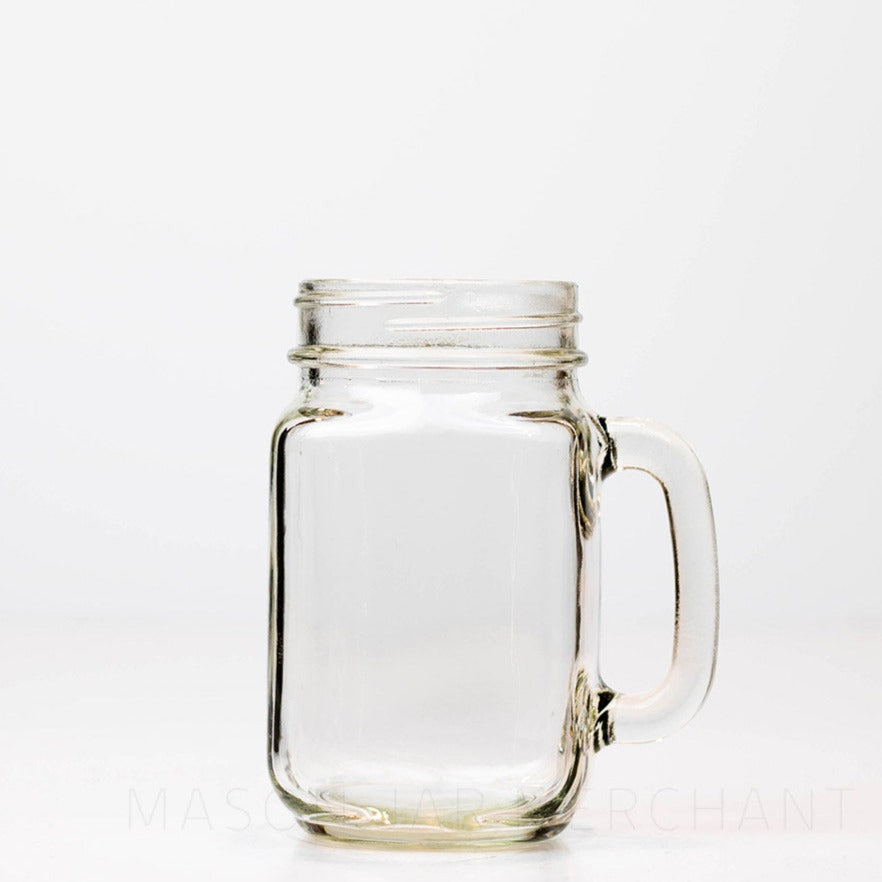 Regular mouth pint mason jar mug against a white background