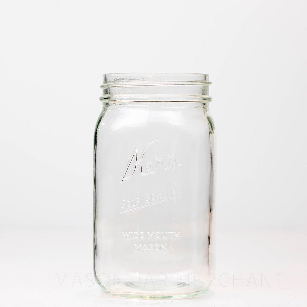 Wide mouth quart mason jar with Kerr self-sealing logo against a white background