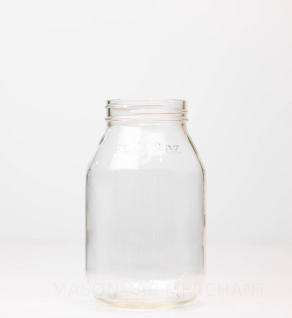 A 6.5 inches tall without lid regular mouth jar on a white background