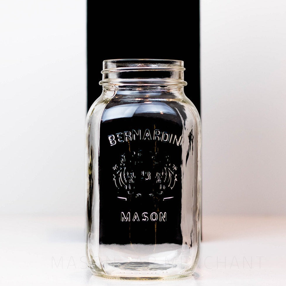Regular mouth shield half gallon reusable mason jar with Bernadin logo against a white background