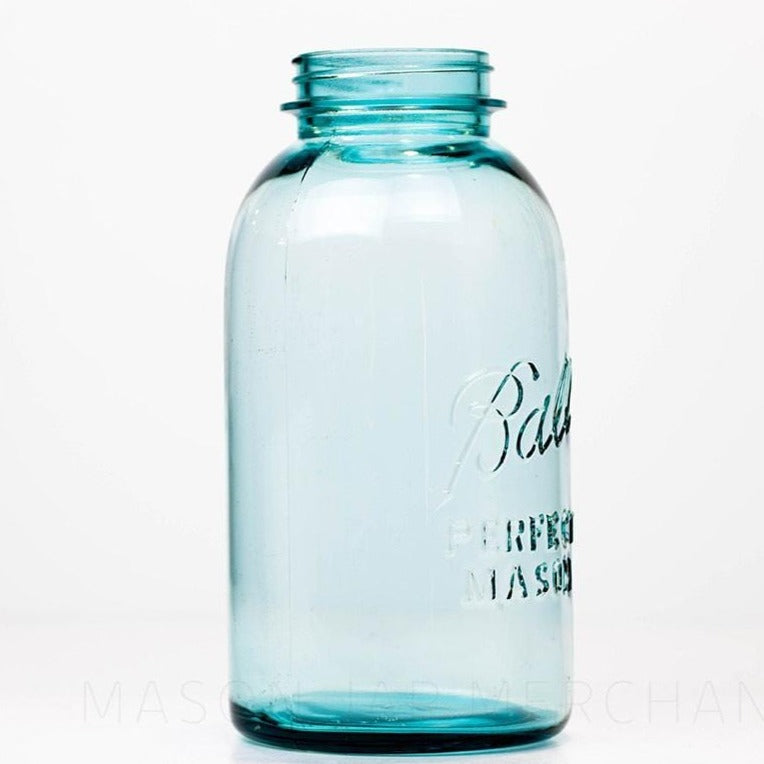Vintage Ball regular mouth blue half gallon mason jar against a white background