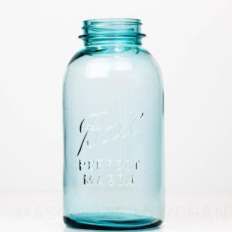 Vintage Ball regular mouth blue half gallon mason jar against a white background