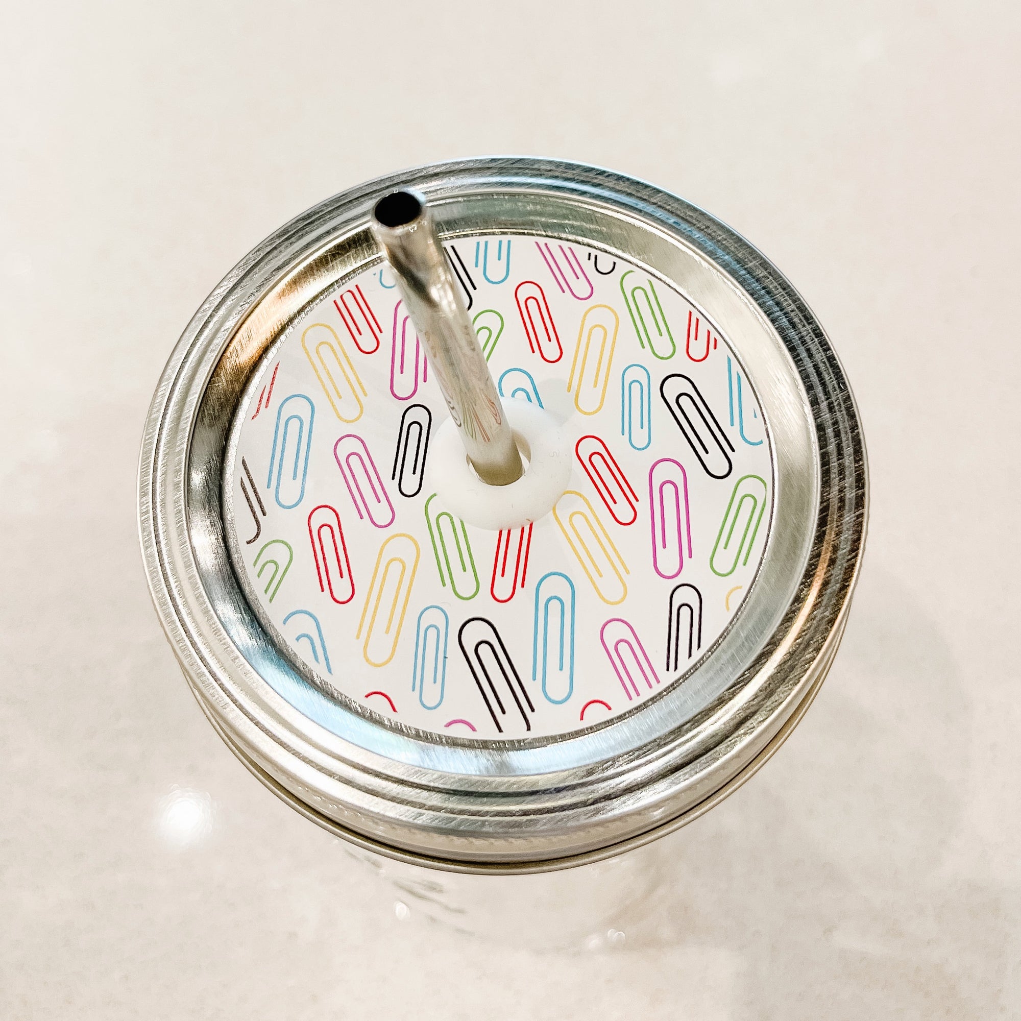 Patterned Mason Jar Straw Lid with Rainbow Paper Clips on White design