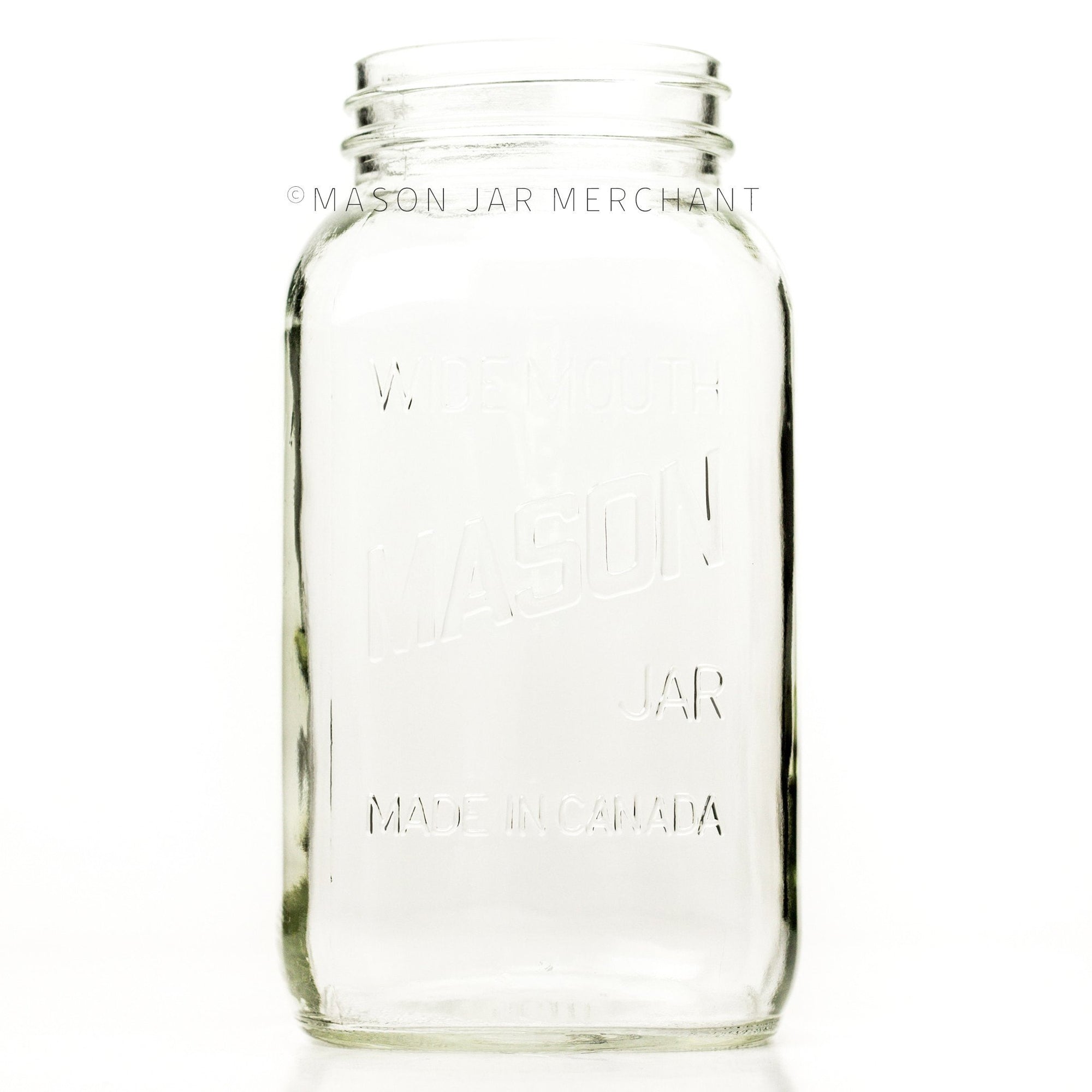 Wide mouth half-gallon mason jar with Mason logo, against a white background 