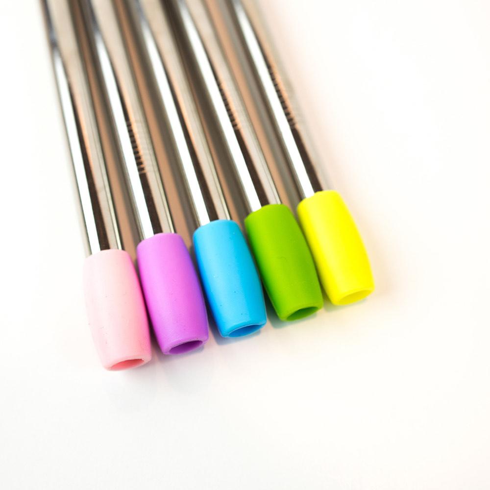 Close-up of stainless steel straws with colourful silicone straw tips against a white background 