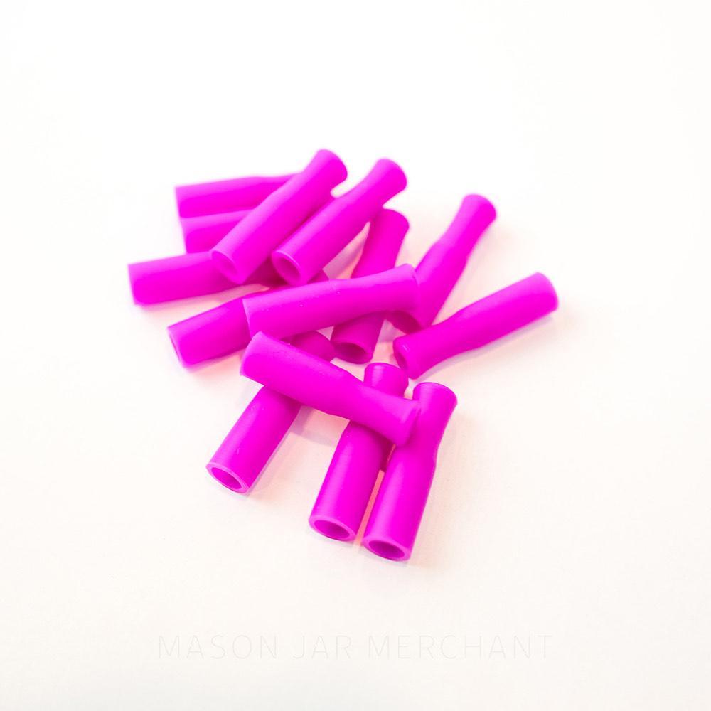 Magenta silicone straw tips for stainless steel straws, set against a white background.