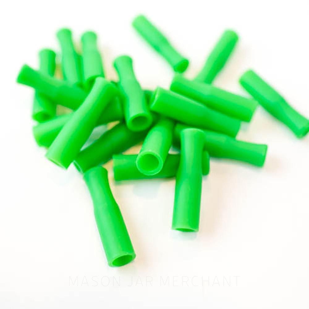 Green silicone straw tips for stainless steel straws, set against a white background.