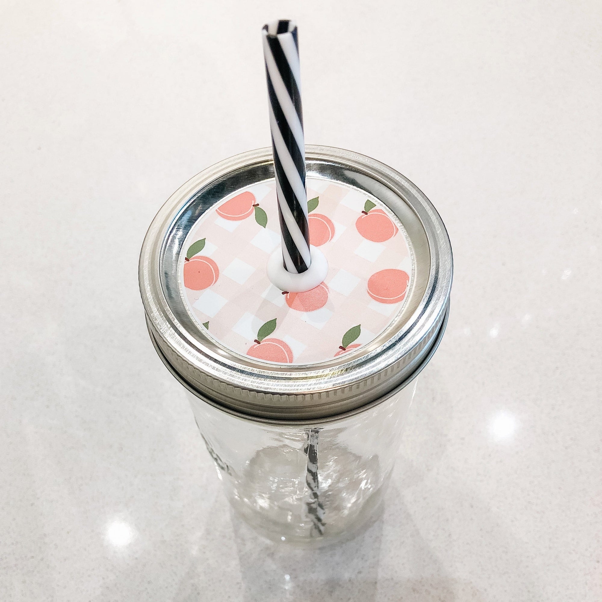 Photo of a peach fest mason jar straw lid