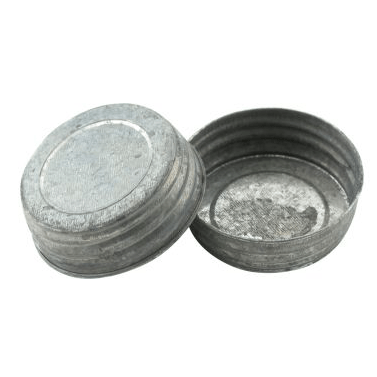 two galvanized solid mason jar lids on a white background