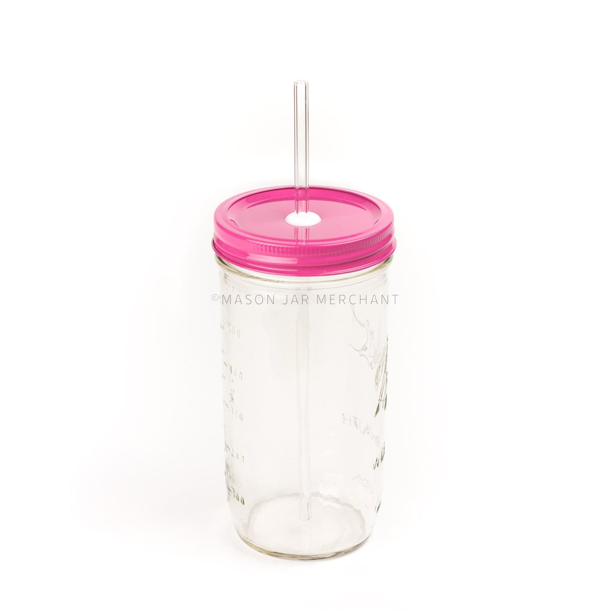 A 24 oz wide mouth mason jar with a hot pink custom painted lid with a white silicone grommet and a glass straw, against a white background