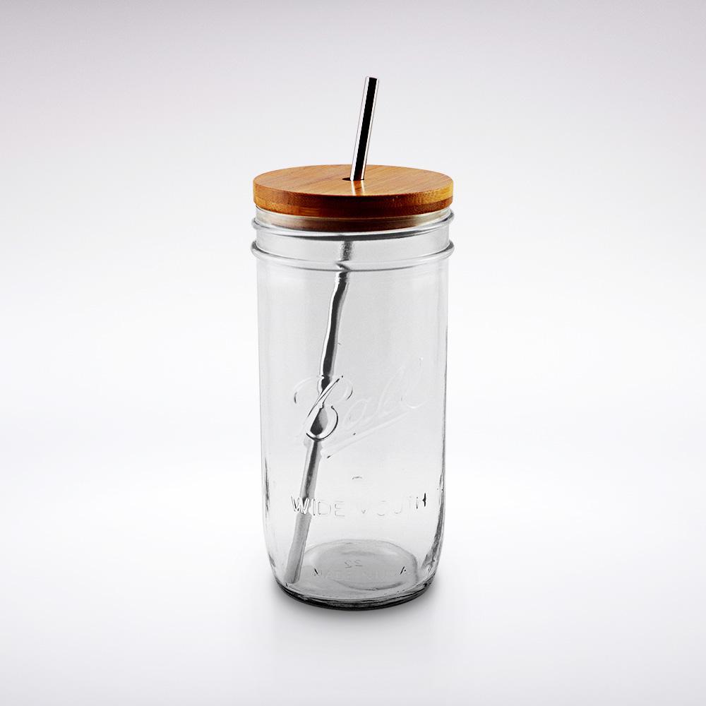 24 oz reusable glass mason jar tumbler with a bamboo straw lid and a silver stainless steel reusable straw