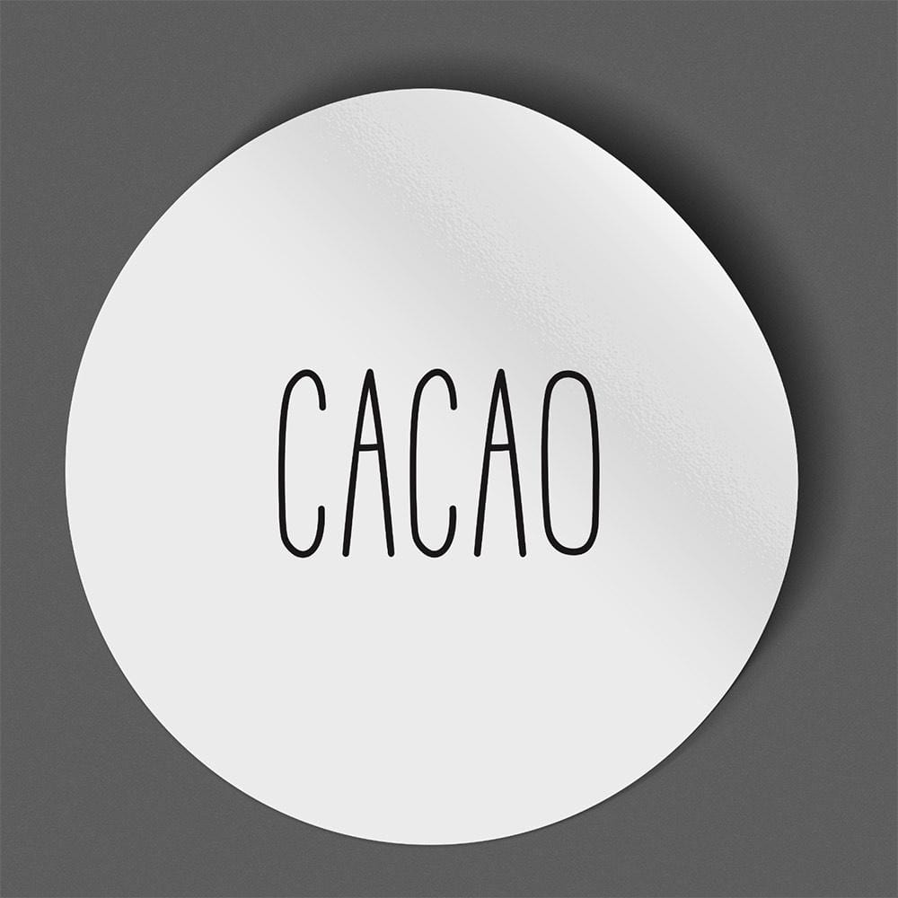 Waterproof label for cacao. Photographed against a gray background.