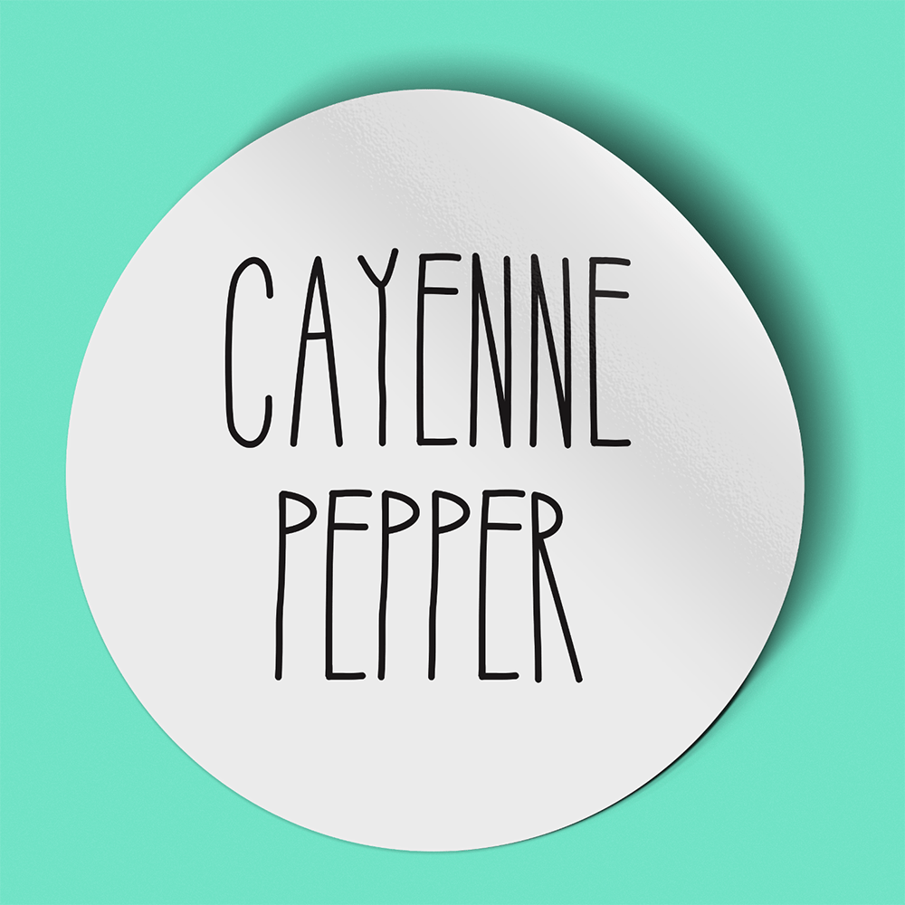 Waterproof label for cayenne pepper. Photographed against a green background.