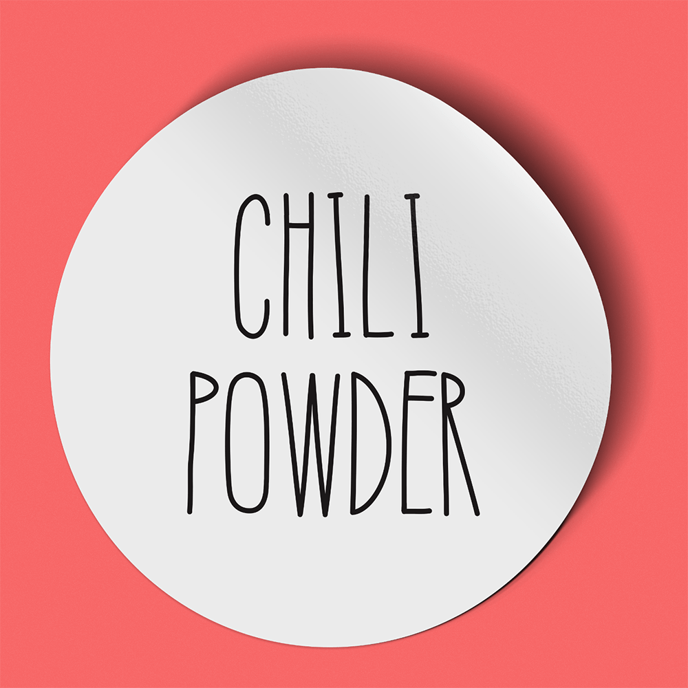 Waterproof label for chili powder. Photographed against a red background.